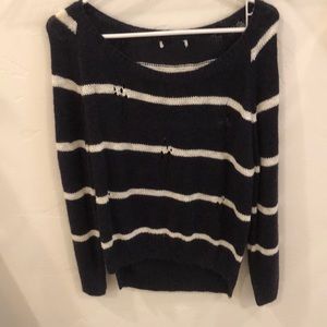 blue and white ripped sweater